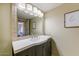 Guest bathroom with a vanity and modern fixtures at 16616 E Palisades Blvd # 206, Fountain Hills, AZ 85268