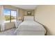 Bright bedroom with a double bed and window view at 16616 E Palisades Blvd # 206, Fountain Hills, AZ 85268