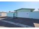 Light blue single car garage with white door at 17318 N Del Webb Blvd, Sun City, AZ 85373