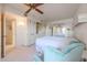 Main bedroom with built-in wardrobe and ensuite bathroom at 17318 N Del Webb Blvd, Sun City, AZ 85373