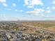 This aerial view provides perspective on the region's infrastructure, distant mountain views, and residential developments at 1743 E Menlo St, Mesa, AZ 85203