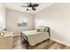 Inviting bedroom features natural light and a ceiling fan at 1743 E Menlo St, Mesa, AZ 85203