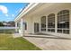 Spacious covered patio with arched windows, offering a serene outdoor living space at 1743 E Menlo St, Mesa, AZ 85203