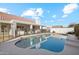 Relaxing pool and patio area enclosed by a safety fence, perfect for Gathering fun at 1743 E Menlo St, Mesa, AZ 85203