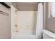 Clean bathroom with a shower and bathtub at 17774 W Watson Ln, Surprise, AZ 85388