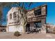 Two-story house with a white garage door and landscaping at 17774 W Watson Ln, Surprise, AZ 85388