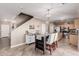 Bright kitchen with stainless steel appliances and an island at 17774 W Watson Ln, Surprise, AZ 85388