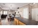 Kitchen with an island, view of dining and living areas at 17774 W Watson Ln, Surprise, AZ 85388