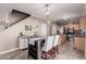 Bright kitchen with stainless steel appliances and an island at 17774 W Watson Ln, Surprise, AZ 85388