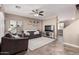 Open living room with a view of kitchen and staircase at 17774 W Watson Ln, Surprise, AZ 85388