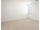 Well-lit bedroom with carpeted floor and window with blinds at 17814 W Carol Ave, Waddell, AZ 85355