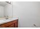 Updated bathroom with a modern vanity and a large mirror at 1799 E Erie St, Gilbert, AZ 85295