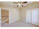 Spacious bedroom with double door closet and stairs at 1799 E Erie St, Gilbert, AZ 85295