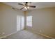 Well-lit bedroom with double door closet at 1799 E Erie St, Gilbert, AZ 85295