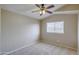 Bright bedroom with window and ceiling fan at 1799 E Erie St, Gilbert, AZ 85295