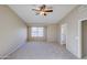 Bedroom with vaulted ceiling and carpet flooring at 1799 E Erie St, Gilbert, AZ 85295