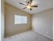 Bright bedroom with window blinds and ceiling fan at 1799 E Erie St, Gilbert, AZ 85295