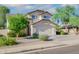 Two-story house with a two-car garage and mature landscaping at 1799 E Erie St, Gilbert, AZ 85295