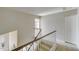 Upstairs hallway with view to another bedroom at 1799 E Erie St, Gilbert, AZ 85295