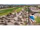 Home with pool, overlooking a golf course and desert landscape at 18007 W Ocotillo Ave, Goodyear, AZ 85338