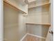 Large walk-in closet with ample shelving and hanging space at 18007 W Ocotillo Ave, Goodyear, AZ 85338