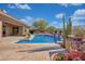 Inviting pool and spa with a beautiful view at 18007 W Ocotillo Ave, Goodyear, AZ 85338