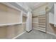 Spacious walk-in closet with ample shelving and hanging space at 18007 W Ocotillo Ave, Goodyear, AZ 85338