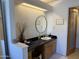 Clean bathroom with a large vanity and modern fixtures at 1832 N 52Nd St # 205, Phoenix, AZ 85008