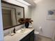 Bathroom with green vanity and large mirror at 1832 N 52Nd St # 205, Phoenix, AZ 85008