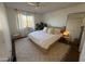 Bright and airy bedroom with a king-size bed and large window at 1832 N 52Nd St # 205, Phoenix, AZ 85008