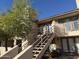 Condo building with stairs and surrounding landscape at 1832 N 52Nd St # 205, Phoenix, AZ 85008