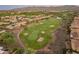 Aerial view of houses and a golf course at 18873 N 262Nd Dr, Buckeye, AZ 85396