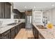 Modern kitchen with stainless steel appliances and granite countertops at 18873 N 262Nd Dr, Buckeye, AZ 85396