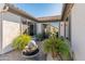 Private courtyard with fountain and potted plants at 18873 N 262Nd Dr, Buckeye, AZ 85396