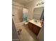 Bathroom with tub, toilet, and wood vanity at 19379 N Miller Way, Maricopa, AZ 85139