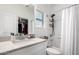 Clean bathroom with a tub, shower, and granite vanity at 22125 N 29Th Ave # 127, Phoenix, AZ 85027