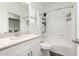 Bright bathroom featuring a shower-tub combination with a white vanity and neutral countertop at 22125 N 29Th Ave # 127, Phoenix, AZ 85027