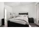 Bright bedroom with a queen bed, nightstands, and a dresser at 22125 N 29Th Ave # 127, Phoenix, AZ 85027