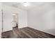 Cozy bedroom showcasing an ensuite bathroom, vinyl wood floors and a ceiling fan at 22125 N 29Th Ave # 127, Phoenix, AZ 85027