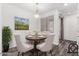 Cozy dining area with a wood table and chairs, complemented by stylish decor at 22125 N 29Th Ave # 127, Phoenix, AZ 85027