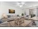 Comfortable living room with neutral-toned furniture, area rug, and bright natural light at 22125 N 29Th Ave # 127, Phoenix, AZ 85027