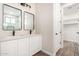 Bathroom with double vanity, quartz countertops, and modern fixtures at 23437 E Cactus Forest Rd, Florence, AZ 85132