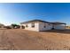 New construction home with stucco exterior and two-car garage at 23437 E Cactus Forest Rd, Florence, AZ 85132