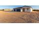 New construction home exterior view, two car garage at 23437 E Cactus Forest Rd, Florence, AZ 85132