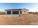 Two-car garage with attached covered patio and desert landscaping at 23437 E Cactus Forest Rd, Florence, AZ 85132