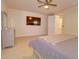 Spacious bedroom with large TV and ensuite bathroom access at 2508 N Franz Ln, Casa Grande, AZ 85122