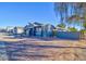 Single-story home with gray exterior, two-car garage, and desert landscaping at 2508 N Franz Ln, Casa Grande, AZ 85122