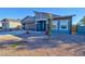 Modern home's exterior with a gray facade and a two-car garage at 2508 N Franz Ln, Casa Grande, AZ 85122