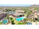 Aerial view of house with pool, solar panels, and desert landscape at 28957 N 70Th Dr, Peoria, AZ 85383