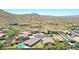 Aerial view of houses in a mountainside community at 28957 N 70Th Dr, Peoria, AZ 85383